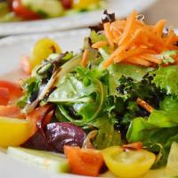 A La Carte Small Mixed Green Salad · Mixed green salad with tomatoes, cucumbers, carrots, and your choice of dressing.