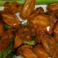 10 Chicken Wings · Fried. House seasoning, house buffalo sauce.