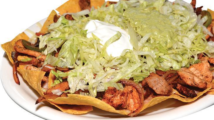 Fajita Nachos · Cheese nachos topped with beans, steak, grilled chicken or shrimp, onions, and peppers. Covered with lettuce, guacamole, and sour cream.