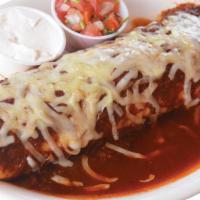 Hot & Spicy Burrito · Large flour tortilla stuffed with beef, beans, rice, and chile colorado. Topped with melted ...