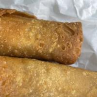 A2 Shanghai Spring Rolls · Vegetarian. Two pieces. Cabbage, carrots, and rice noodles in crispy spring roll wrapper.