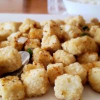 A7 Crispy Tofu · Vegetarian. Golden brown fried tofu tossed with sweet peppers, onions, scallions, and spicy ...