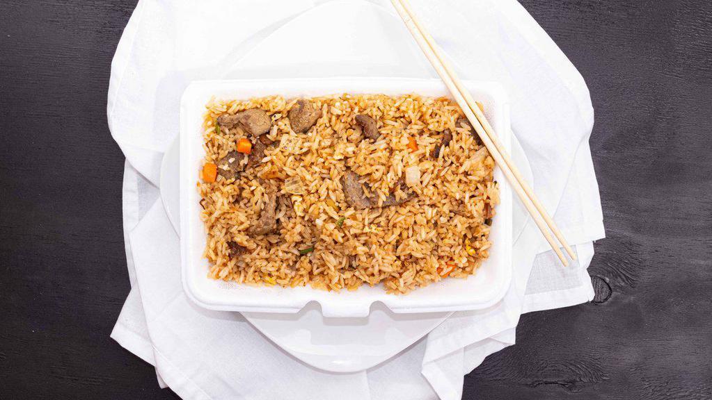 R1 Fried Rice · Wok-fried rice blended with egg, onions, carrots, green peas, soy sauce, and cooked with white rice. Served with Shanghai spring roll.