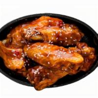 Bone-In Wings · Classic bone-in wings oven- baked, cooked to order perfectly crisp, tossed with your choice ...