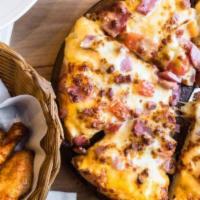 Small Chicken Ranch Pizza And Wings · Grilled chicken with crispy red onions and green peppers with a sour hint of tomato, all on ...
