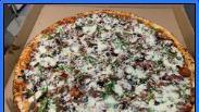 Vegetarian Pizza · Green peppers, banana peppers, mushroom, onion, black olives, tomato, and spinach.