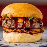 The Hoss · Stuffed with cheddar, topped with Benton's bacon, onion crispers, hickory smoke BBQ sauce, a...