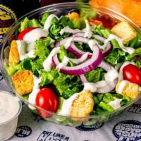 Side Salad · Organic spring mix, tomato, onion,  herbed croutons, and your choice of dressing (house-made...