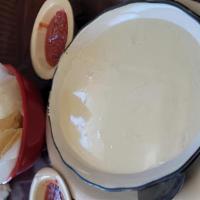 Queso Dip · Small $ 5.20 
Large $ 11.50