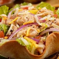 Taco Salad · Crispy flour tortilla filled with beef or chicken, cheese, lettuce, tomatoes, guacamole and ...