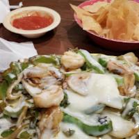 Seafood Fajita · Jumbo shrimp, scallops, tilapia and crab meat all grilled with tomatoes, bell peppers and on...