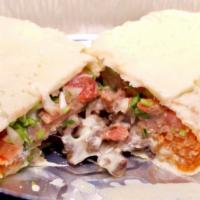 California Burrito · Big burritos stuffed with tender sliced beef, pico de gallo, Spanish rice, beans, guacamole,...