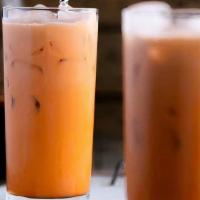Thai Iced Tea · Thai tea filled with Thai tea ice cubes, topped with salted, cold caramel cream foam