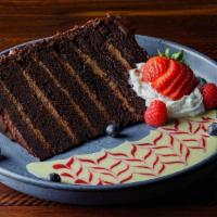 7 Layer Chocolate Cake  · Dark chocolate cake, Callebaut chocolate mousee, Dutch chocolate frosting.