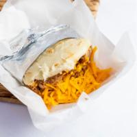 Arepa Rumbera · Cooked Ground Maize Dough shaped into a thick disc, stuffed with Shredded Pork and Yellow Go...