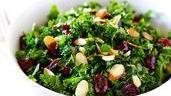 Kale · fresh chopped kale, shredded carrots, red cabbage & sweet cranberries tossed with lemon juic...