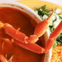Caldo 7 Mares · crab legs, shrimps, fish, mussels, scallops, octopus, served with onion, cilantro and rice
