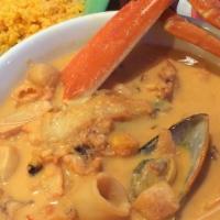 Cazuela De Mariscos · mix seafood soup cooked with our special sauce,  served with rice, onion and cilantro