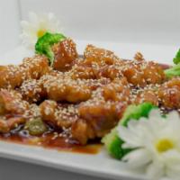 Sesame Chicken · Fried chunks chicken in sesame sauce steamed broccoli to serve.
