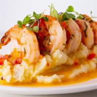 Camarones Al Ajillo · sauteed shrimp, pico, white wine, over Yukon gold mash potatoes