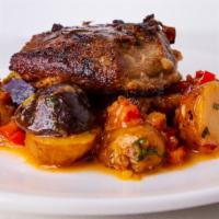 Maracuya Pork Belly · Slow braised pork belly served over pico, fingerling potatoes, white wine butter, passion fr...