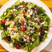 Greek Salad · Fresh cut romaine lettuce, onion, green pepper, cherry tomatoes, black olives and feta chees...