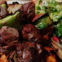 Lamb Kabab Platter · Marinated charcoal-grilled lamb.