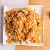 L403 Pineapple Fried Rice · Classic Thai fried rice with chicken, egg, onions, and pineapple chunks
