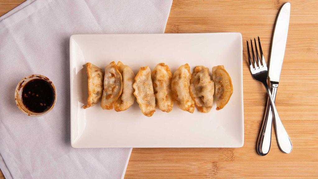Gyoza (8) · Dumpling filled with a mixture of chicken, pork and vegetables (steamed or fried)..
