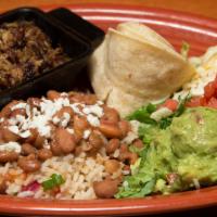 Mexican Barbacoa · Nuestro favorito! Slow-cooked and shredded pork. Served with Mexican rice, charro beans, gua...