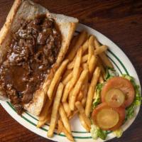 Roast Beef · Thinly sliced, oven warmed roast beef, piled high & topped with flavorful gravy. Add Swiss c...