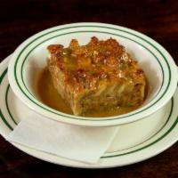 Banana Bread Pudding · Topped with traditional New Orleans rum sauce.