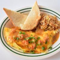 Atchafalaya · Crawfish étouffée over a crawfish dressing & Creole trinity filled omelet.