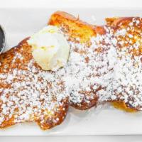 French Toast  · 3 slices of brioche dipped in vanilla infused egg and milk mixture blend, then grilled to pe...