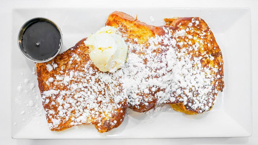 French Toast  · 3 slices of brioche dipped in vanilla infused egg and milk mixture blend, then grilled to perfection and topped with powdered sugar and butter.