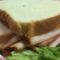 Ham Sandwich · Served with chips.