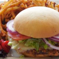 Black Bean Burger · Served with fresh lettuce, red onion, tomatoes, and pepper jack cheese on a tennessee roll.