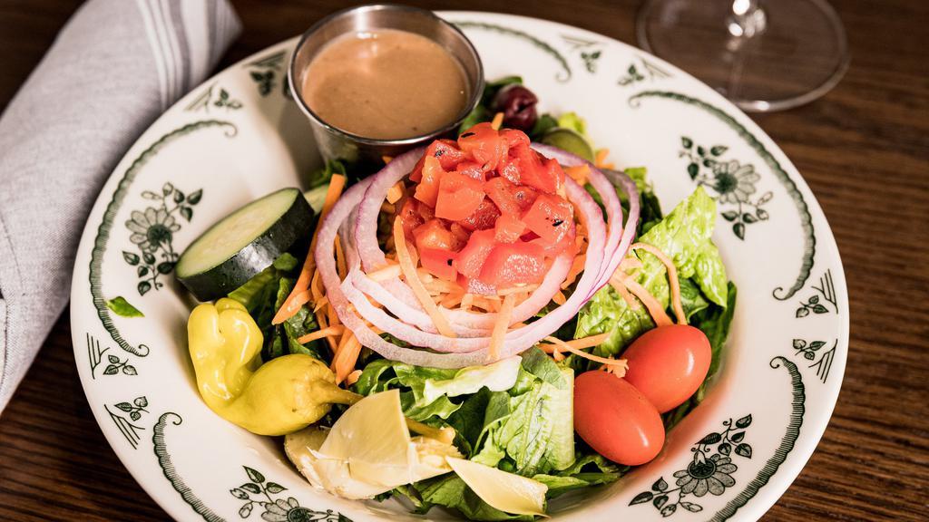 Mama’S Salad Half · Romaine, artichoke hearts, roasted red
peppers and vine-ripened cherry
tomatoes, w. Your choice of dressing..