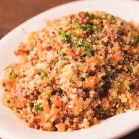 Warm Quinoa Salad  · With carrots, kale and
oven-dried tomato and lemon