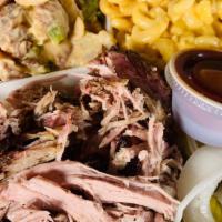 Pulled Pork Platter · Served with choice of sides (2), pickles & white bread.