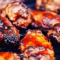 Smoked Wings - 6 · Smoked slow & low then flash fried, served with spicy house made BBQ sauce ranch, blue chees...