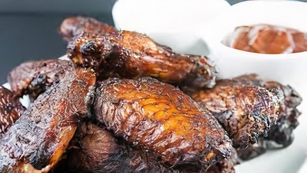Smoked Wings - 12 · Smoked slow & low then flash fried, served with spicy house made BBQ sauce ranch, blue cheese or soul sauce.