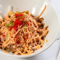Kani Salad · Spicy. Crab meat, cucumber, masago,tempura flakes, and sesame seed with special sauce