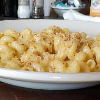 Mac And Cheese · Vegetarian. Cavatappi pasta tossed in our creamy cheddar and Parmesan cheese sauce. Topped w...