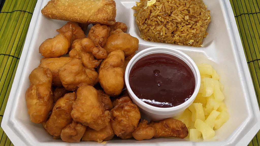 Cbo Sweet & Sour Chicken · Chunks of breaded boneless chicken breast fried until golden brown served with pineapple chunks and sweet-sour sauce on the side