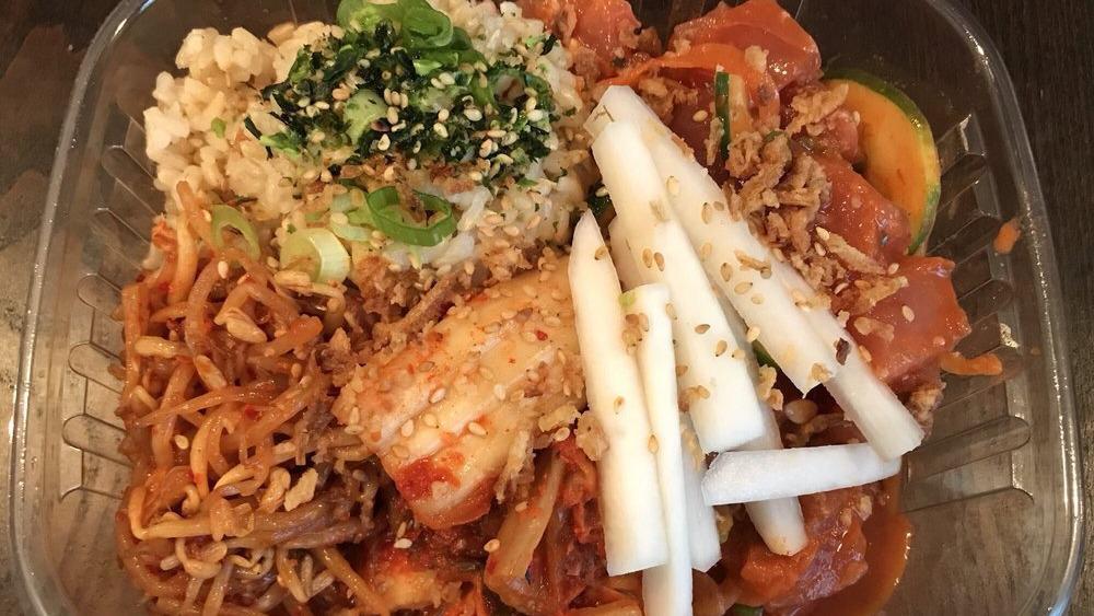 Gochu · White rice, tuna, sweet onions, cucumbers, tangy gochu marinade, kimchi, edamame, fried onions, sesame seeds.