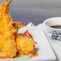 Shrimp Tempura ( A ) · Lightly Breaded, deep fried shrimp in tempura
batter served with honey plum wine sauce.