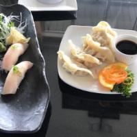 Nigiri Sashimi Appetizer* · Assortment of chef’s choice fresh fish (sashimi +$2)