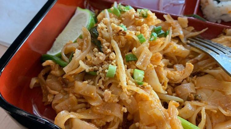 Pad Thai (Gf) · Stir fried rice noodles with eggs, bean sprouts, and scallions in Pad Thai sauce served with ground peanuts and lime wedge