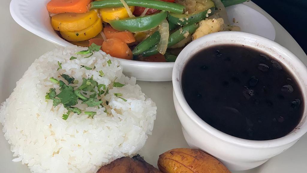 Vegetarian Combination · White rice, black beans, sautéed mixed vegetables, and plantains.